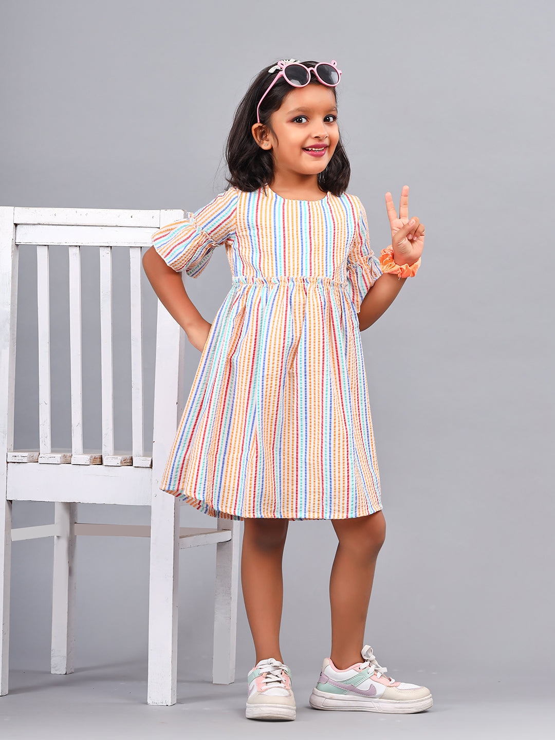 Zion Girls A line Dress in Seer Sucker Fabric with Bell sleeves & Ruffle Highlights in waist line-Mustard