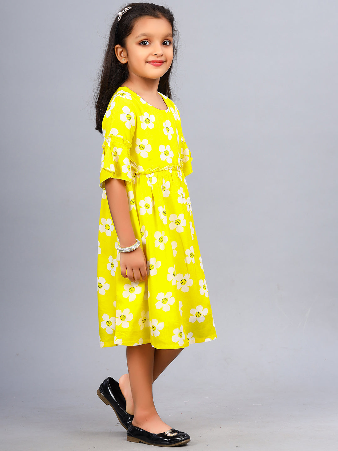 Zion Girls Printed Fit and Flare Dress with ruffle highlights & Bell Sleeves-Yellow